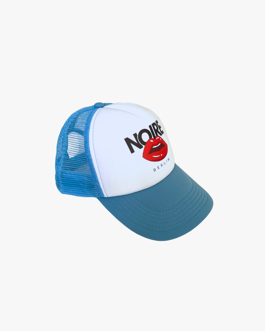 Side view of Noire Berlin/Noire Clothing Baby Blue Trucker Cap featuring red lips logo and white front panel.